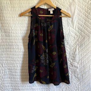 Sleeveless Loft multi color blouse.